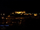 The castle at night looks pretty.